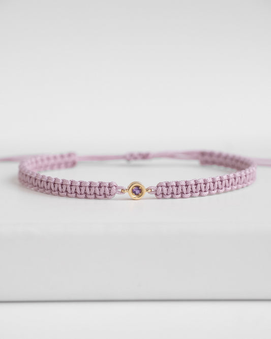 Purple cord bracelet with gold clasp and amethyst
