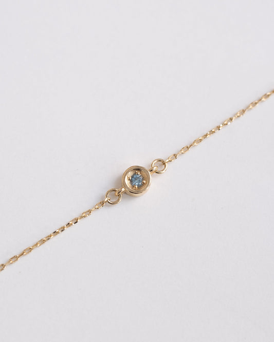 fine gold bracelet with aquamarine