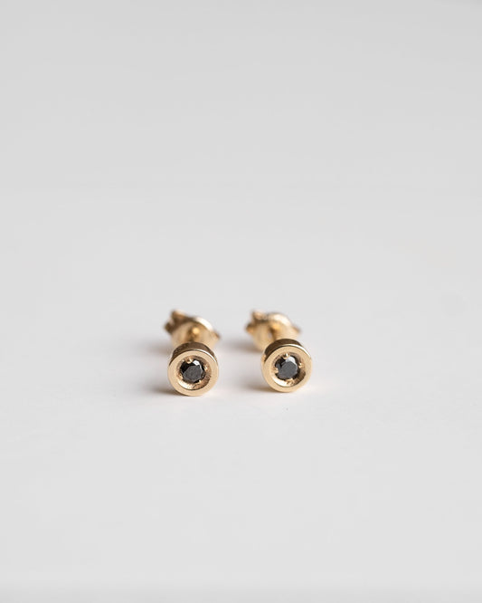 gold stud earrings with black diamond