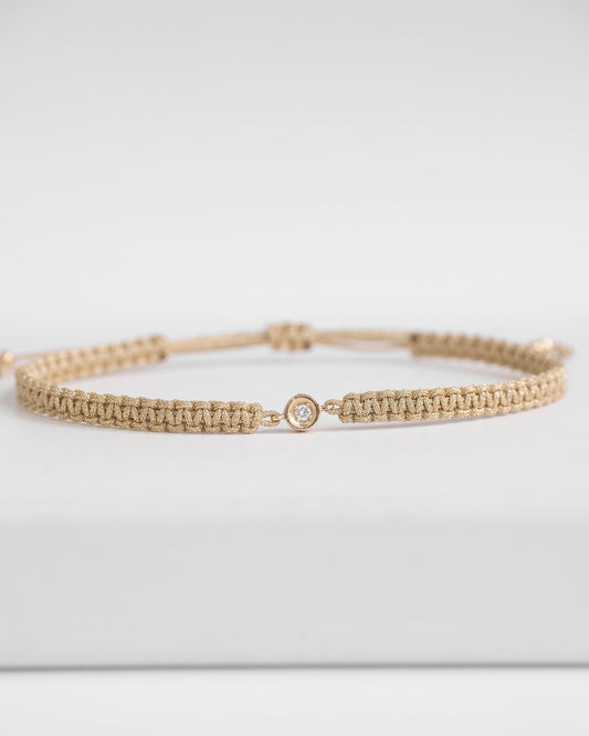 gold cord bracelet with diamond and gold clasp