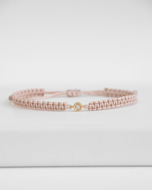 baby pink cord bracelet with diamond and gold clasp