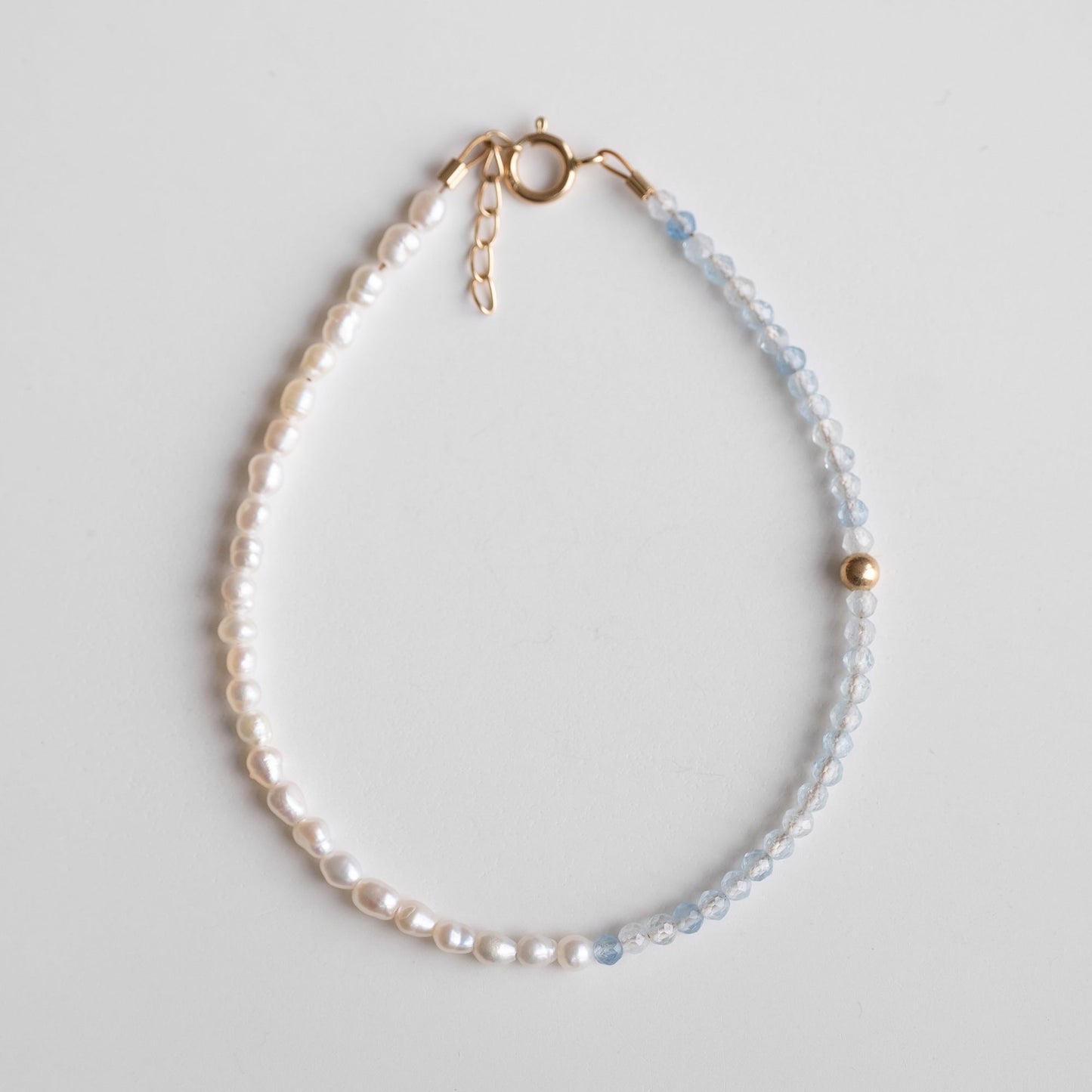 gold bracelet with pearls and aquamarine 