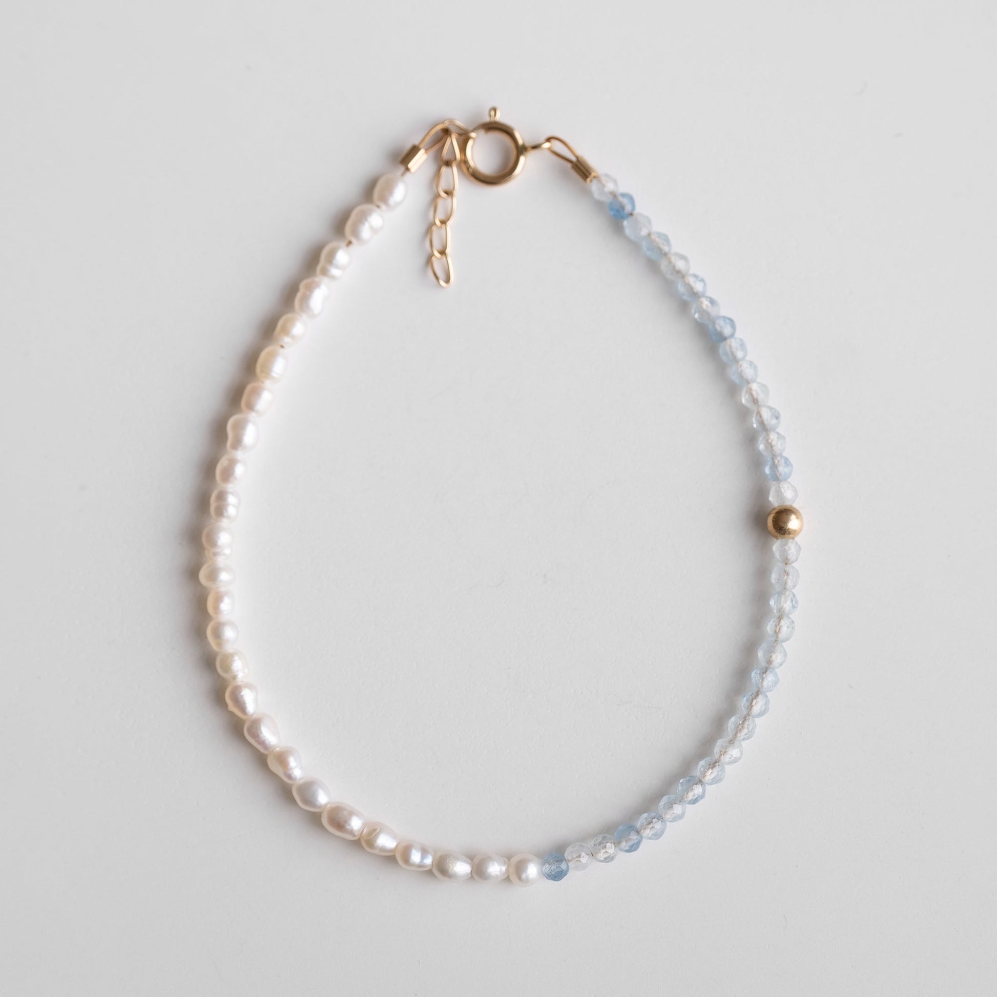 gold bracelet with pearls and aquamarine 