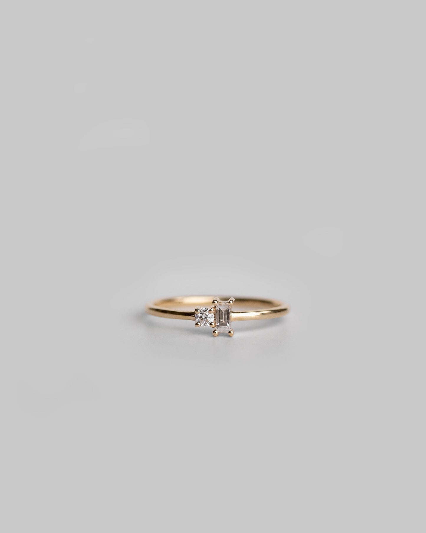 Baguette And Round Diamond Ring