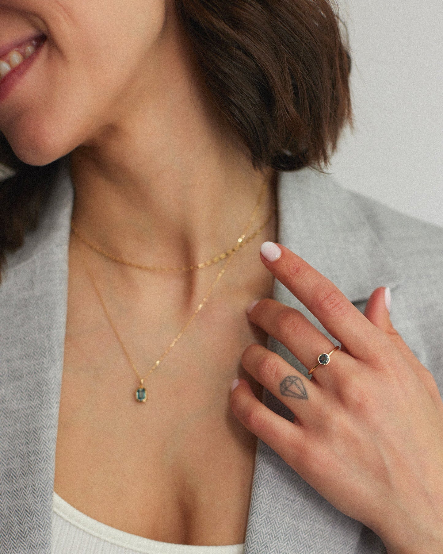 Bezel Set Teal Sapphire Ring