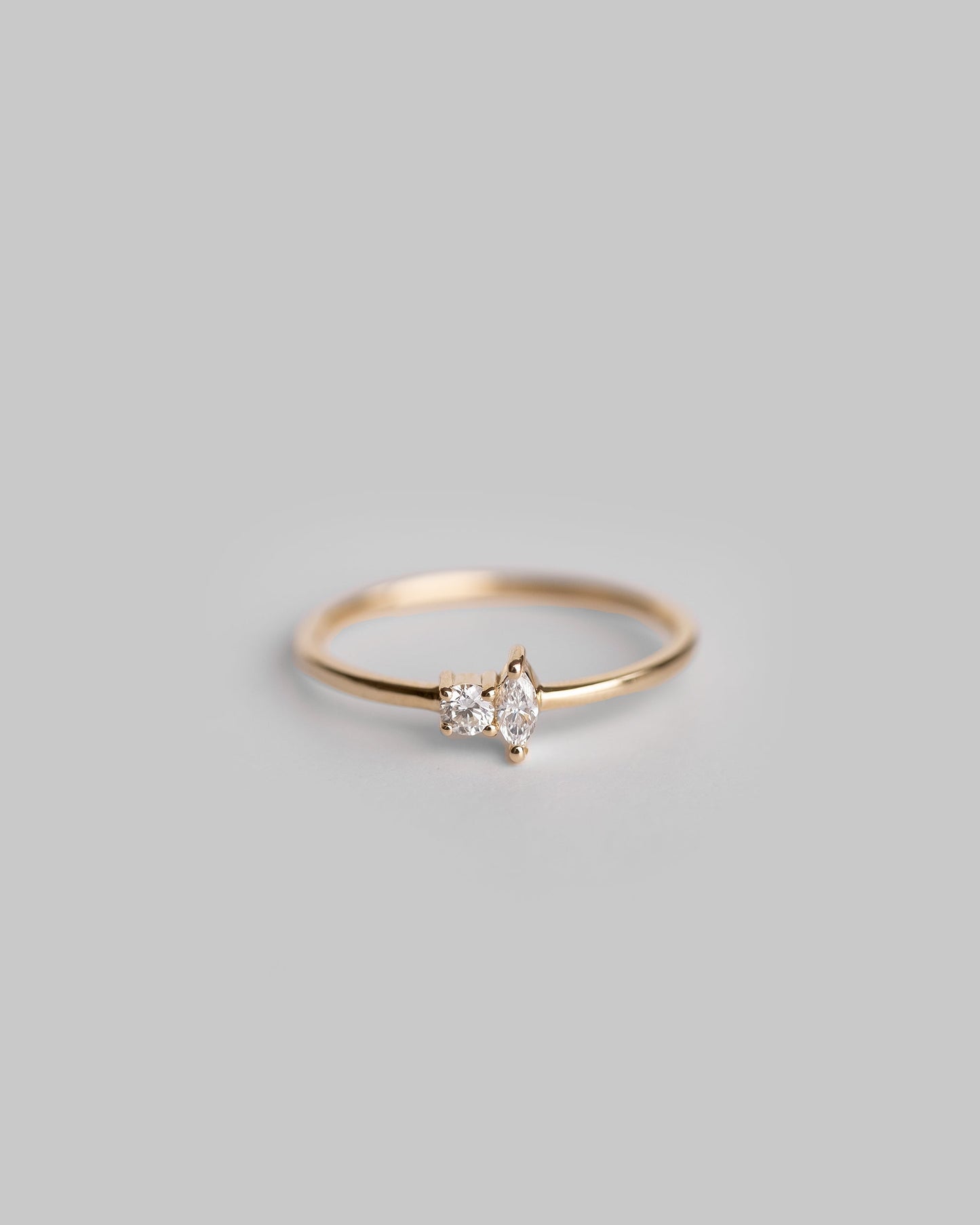 Marquise And Round Cut Diamond Ring