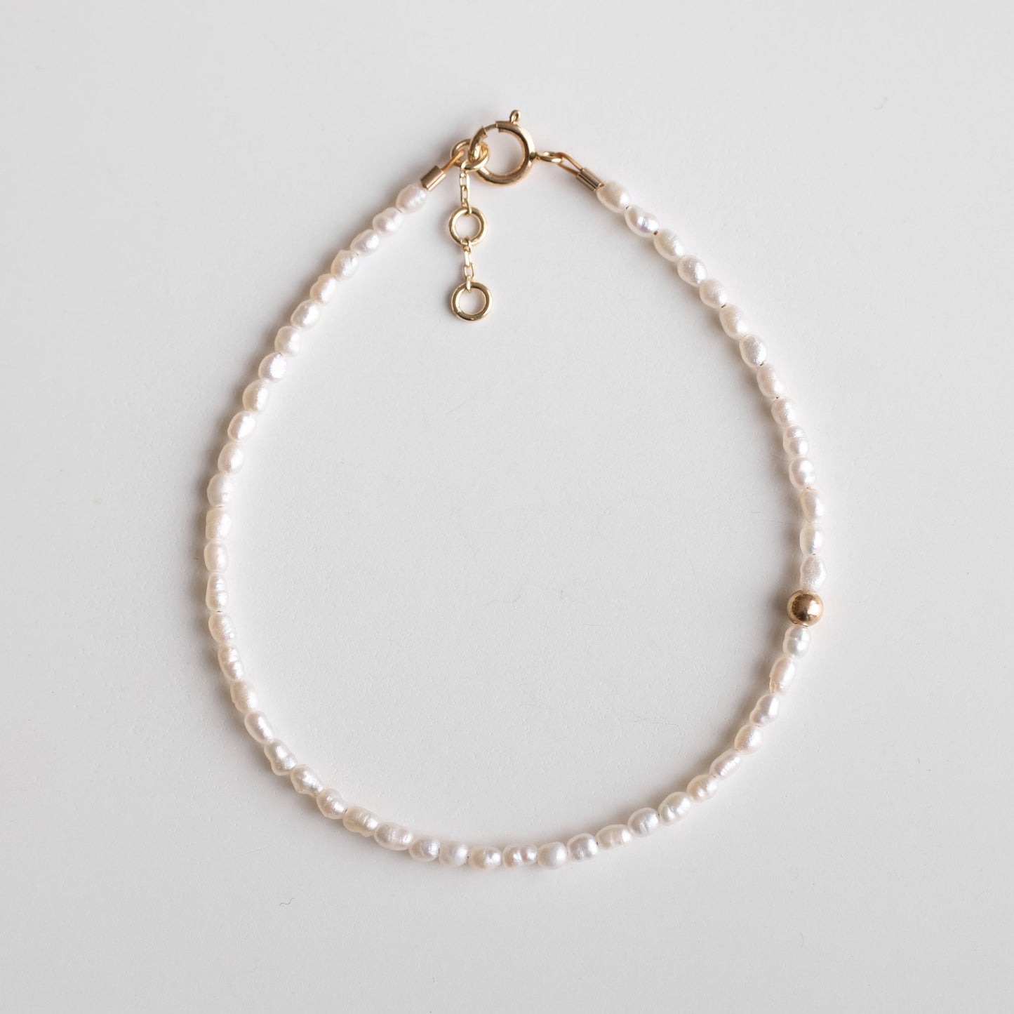 delicate pearl gold bracelet 