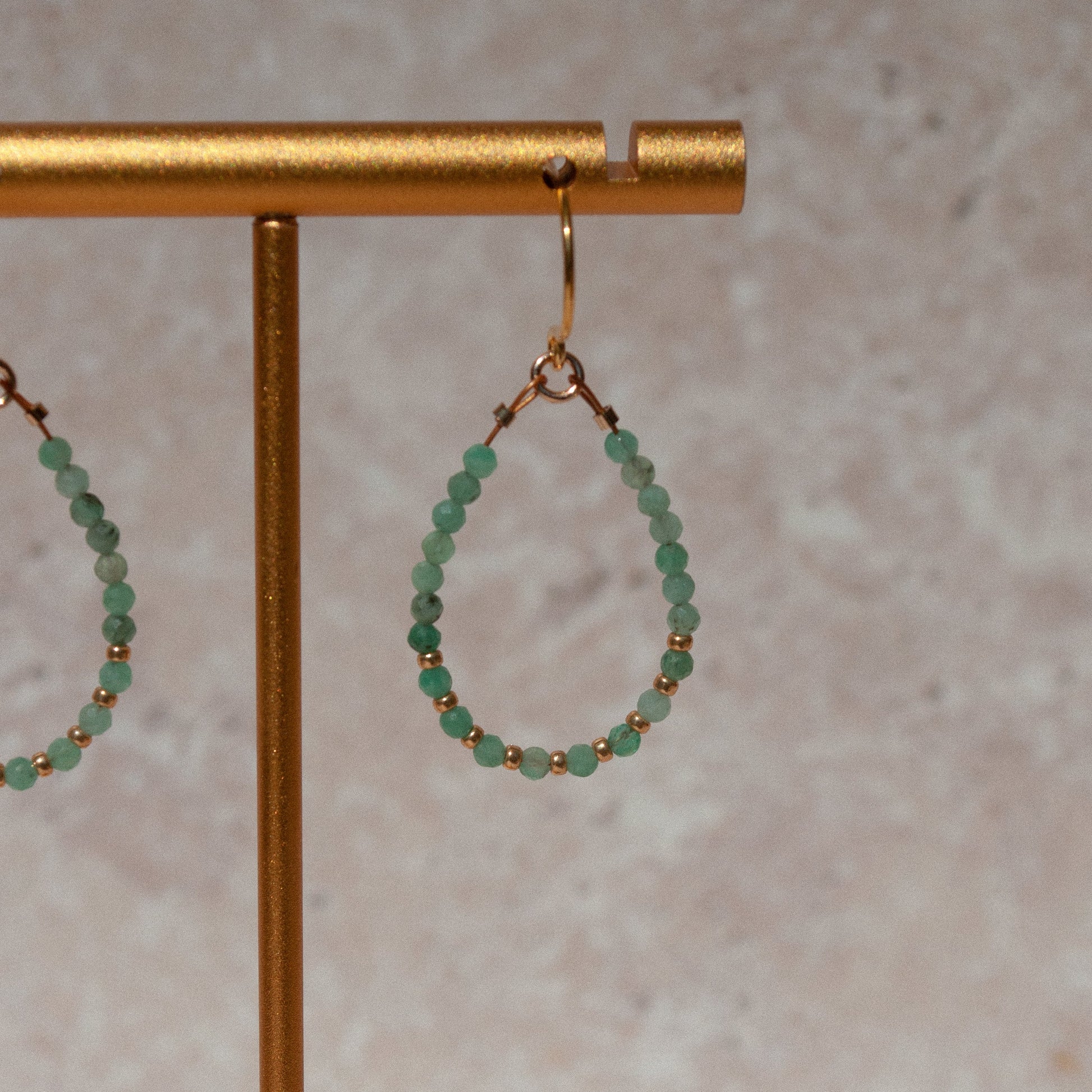 gold vermeil delicate drop earrings with emerald stones 